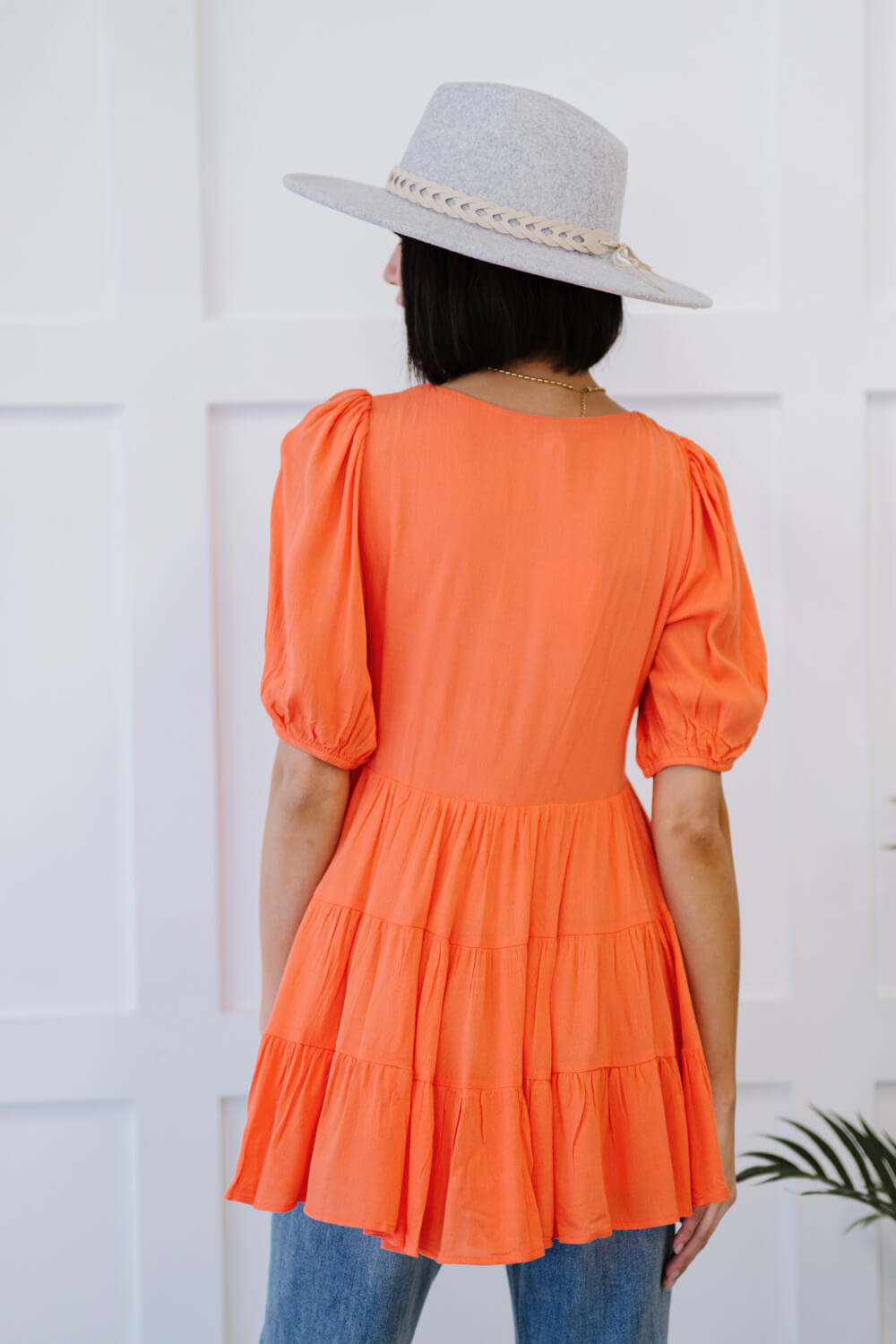 Davi & Dani Smocked Tiered Babydoll Bluse